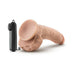 Vanilla-colored 9-inch realistic vibrating device with suction cup base and black wired remote control on white background.