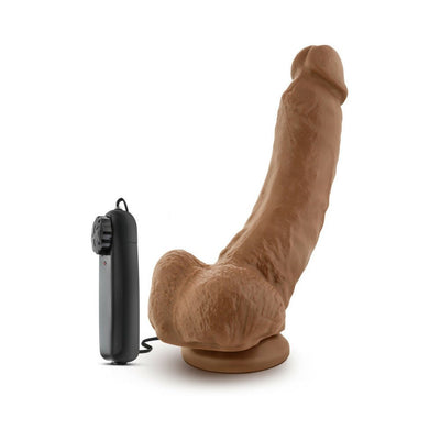 Mocha-colored 9-inch realistic vibrating dildo with remote control and suction cup base on white background.