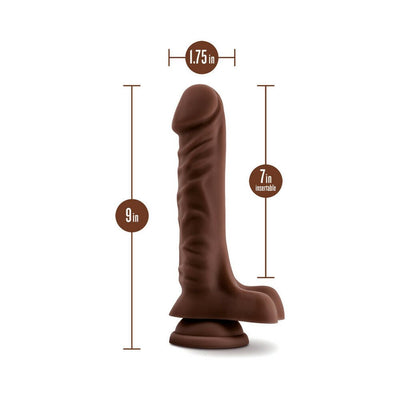 Chocolate-colored realistic dildo with suction base, 9 inches long and 1.75 inches wide, showing 7 inches insertable length.