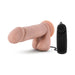 Vanilla-colored realistic vibrating dildo with suction cup base and black remote control with dial.