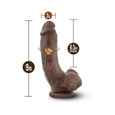 Chocolate-colored realistic dildo with suction cup base, 9 inches long and 2 inches wide, detailed texture and 6.5 inches insertable length.