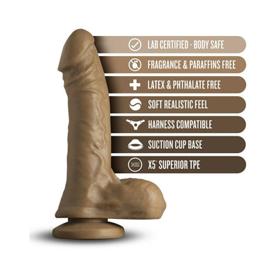 Mocha-colored realistic dildo with suction cup base and safety feature icons highlighting body-safe, fragrance-free, latex-free, soft feel, and harness compatibility.