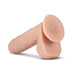 Realistic vanilla-colored silicone adult toy with suction cup base and lifelike texture.