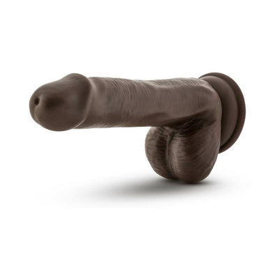 Chocolate-colored realistic dildo with suction cup base and detailed texture on a white background.