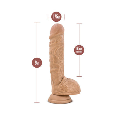 Realistic Latin tan dildo with suction cup base showing 9-inch length and 6.5-inch insertable size measurements.