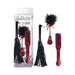 Lovers Kits Whip, Spank & Tickle set with black faux leather whip, red snake print paddle, and feathered tickler with red ribbon.