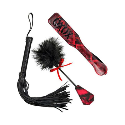 Lovers Kits Whip, Spank & Tickle set with black faux leather whip, red snake print paddle, and feathered tickler with red bow.