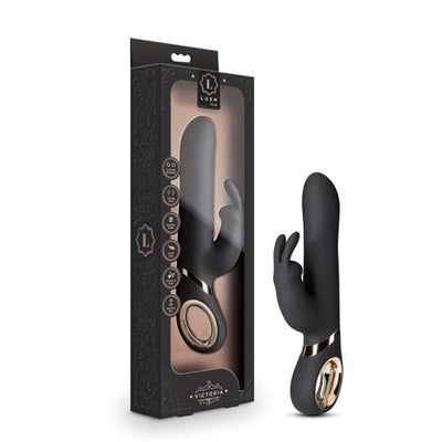 Black Blush Lush Victoria rabbit vibrator with ergonomic design and gold-accented handle next to its elegant black and rose gold packaging.