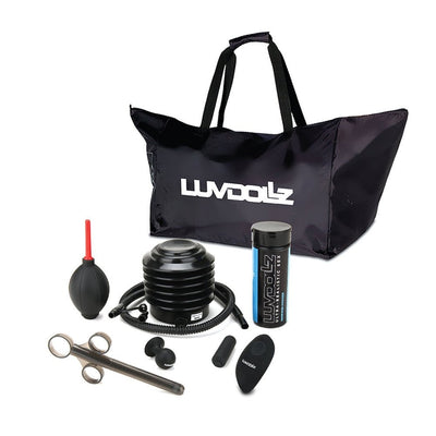 Black Luvdollz storage bag with pump, lubricant, vibrating bullet, remote control, and accessories for inflatable doll kit.