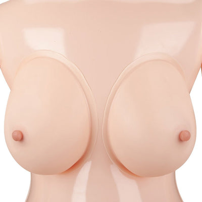 Close-up of life-size inflatable doll torso featuring soft, perky breasts with erect nipples in natural skin tone.