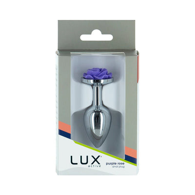 Lux Active metal butt plug with a purple rose base displayed in retail packaging.