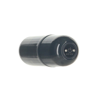 Black cylindrical vibrating bullet with power button on one end, designed for discreet pleasure use.