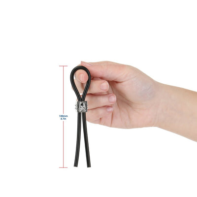 Hand holding black adjustable silicone tether with metal slider, measuring 120mm (4.7in) length.