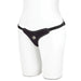 Black velvet bikini-style strap-on harness with adjustable side straps on a white mannequin.