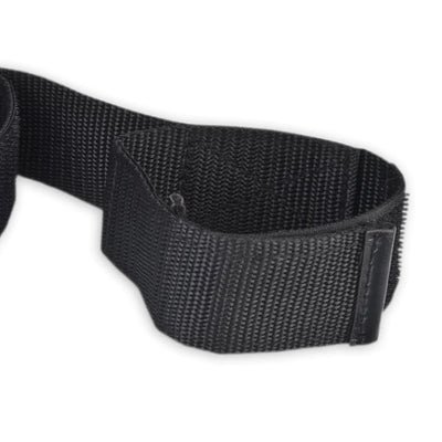 Close-up of black adjustable nylon strap with loop designed for easy wrist or ankle restraint.