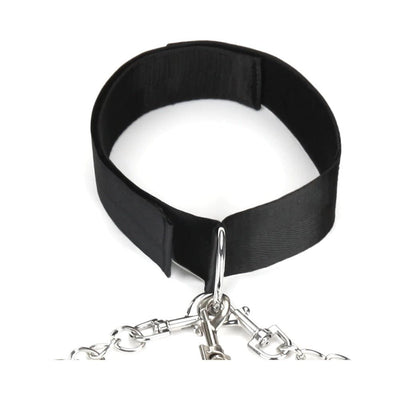 Black adjustable fetish collar with metal D-ring and attached silver chain leash clips on white background
