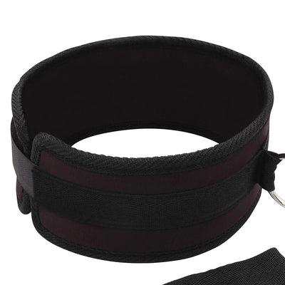Black neoprene padded collar with mesh strap and metal ring detail, part of a fetish collar and leash set.