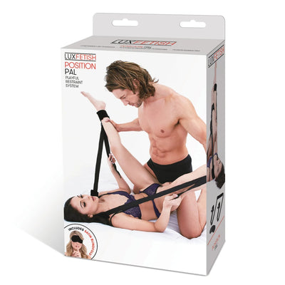 Lux Fetish Position Pal packaging showing a couple using black adjustable restraint straps on a bed.