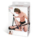 Lux Fetish Position Pal packaging showing a couple using black adjustable restraint straps on a bed.