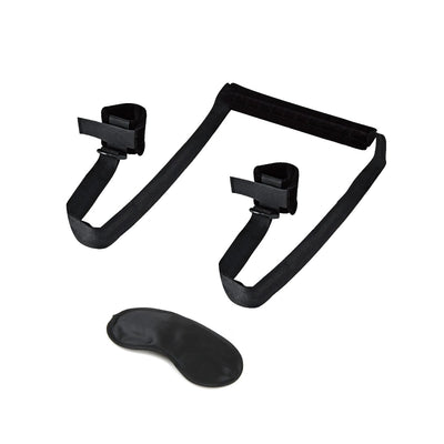Black Lux Fetish Position Pal sex sling with padded straps and included black blindfold on white background
