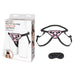 Lux Fetish Pretty In Pink adjustable strap-on harness with black satin blindfold displayed with packaging.