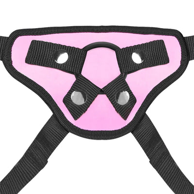 Pink and black adjustable strap-on harness with secure ring and snap closures for customizable fit.