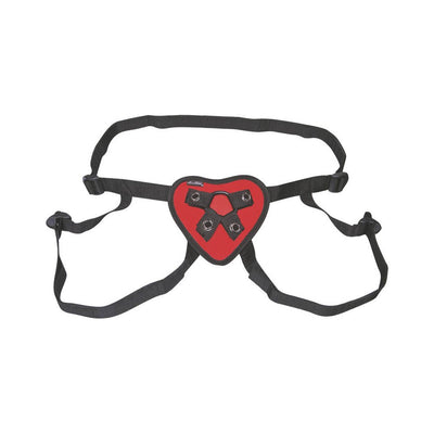 Adjustable black strap on harness with red heart-shaped front panel and metal rings for secure fit.