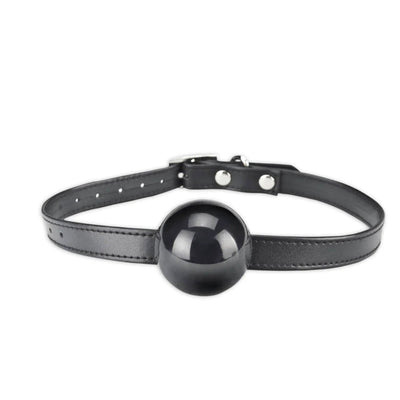 Black silicone ball gag with adjustable black strap and silver buckle hardware on white background.