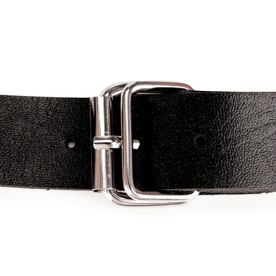 Close-up of black adjustable strap with silver metal buckle on a silicone ball gag accessory.