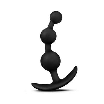 Black silicone anal plug with three graduated spheres and curved ergonomic base for comfortable, safe use.