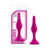 Pink medium-sized beginner plug with tapered tip and flared base, made from smooth silicone, shown with packaging.
