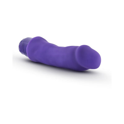 Purple realistic silicone dildo vibrator with curved shaft and textured surface, featuring a twist dial control base.