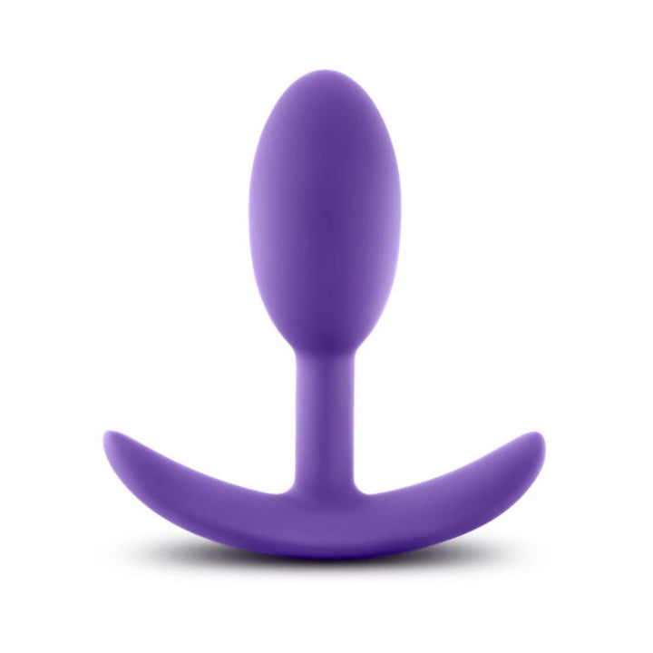 Purple silicone slim wearable anal plug with curved base and smooth tapered tip.