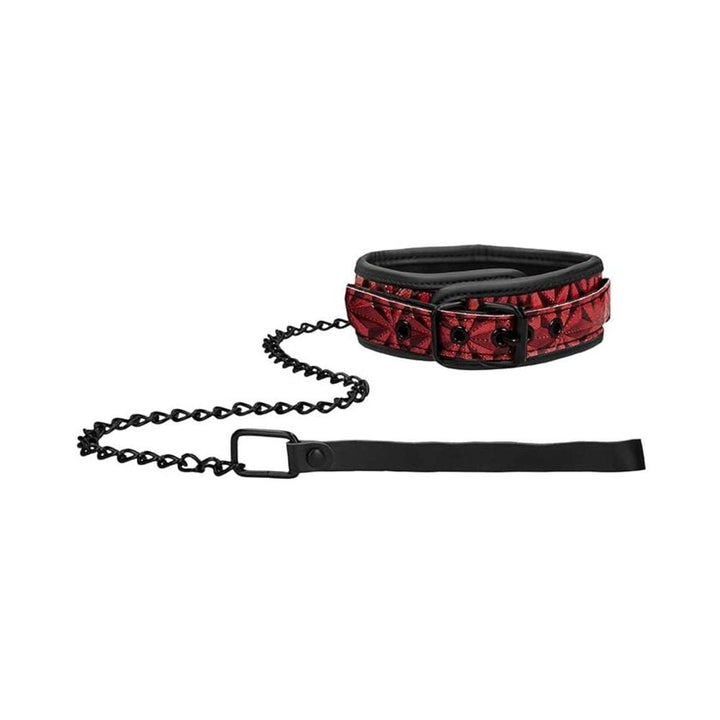 Burgundy luxury collar with diamond pattern and attached black chain leash with handle on white background.