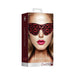 Packaging of a luxury burgundy eye mask with a geometric diamond pattern shown on a model's face.