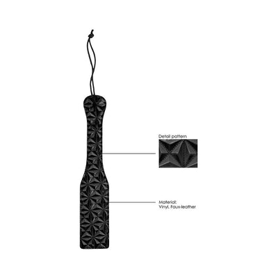 Black luxury paddle with diamond pattern texture, made of vinyl and faux-leather, featuring a wrist strap loop.