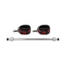 Luxury metal spreader bar with adjustable red and black padded ankle cuffs on a white background.