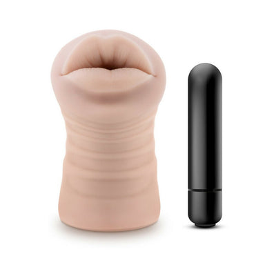 Vanilla-colored realistic textured male masturbator sleeve with separate black vibrating bullet on white background.