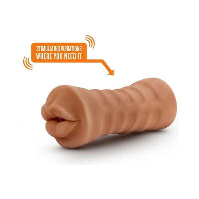 Mocha tan soft mouth stroker with textured sleeve and vibrating bullet for targeted stimulation.