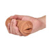 Hand holding a mocha tan soft open-ended mouth stroker with realistic lips detail.
