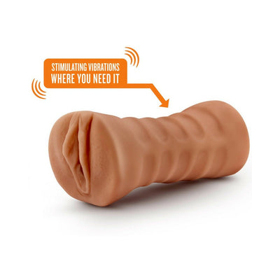 Mocha tan textured male stroker with vibrating bullet for enhanced stimulation, designed for realistic sensation.