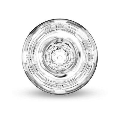 Top-down view of the clear Blush M for Men Soft and Wet Magnifier Stroker showing internal textured chambers.