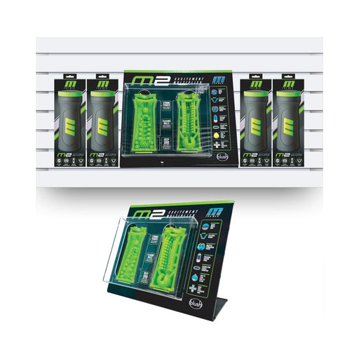 Blush M for Men M2 Merchandising Kit with four black strokers and a green interactive tester display on slat wall and countertop.