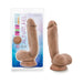Realistic brown dual-density dildo with suction cup base shown inside and outside packaging from Au Naturel Macho Latin collection.