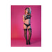 Woman modeling Magic Silk black lace halter bandeau top and matching panty set with thigh-high stockings on pink background.