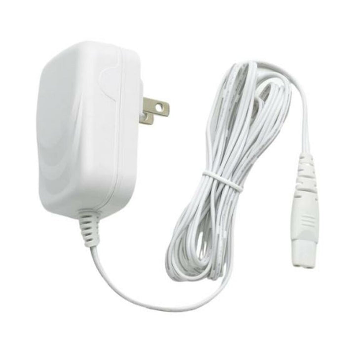 White Magic Wand Mini replacement power adapter with coiled charging cord and two-prong plug for US outlets.