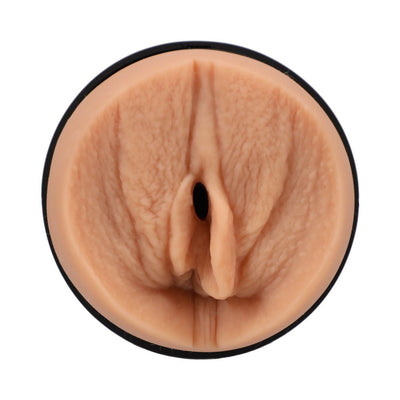 Close-up of a realistic beige ULTRASKYN stroker sleeve designed for intimate use with detailed texture.