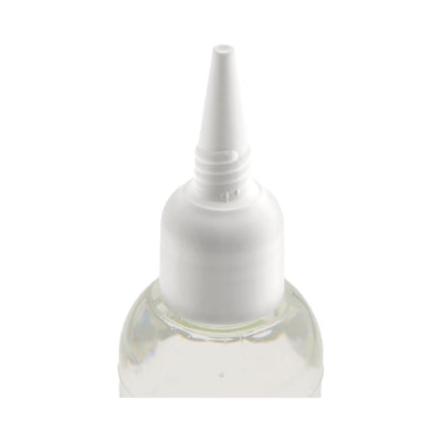 Close-up of clear lubricant bottle with white precision nozzle cap on a white background