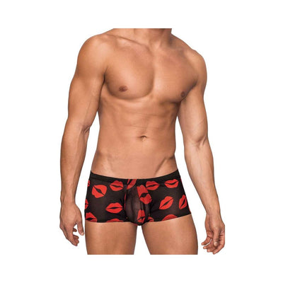 Male model wearing black sheer mini shorts with red lips pattern, showcasing a fitted and stylish design.