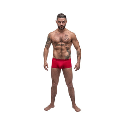 Athletic man wearing red Male Power Pure Comfort Modal Wonder Shorts standing against white background.